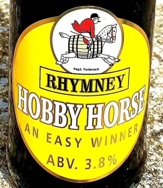 Beer bottle label showing hobby horse logo